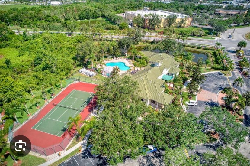 5122 Northridge Road, Unit 102 Sarasota, FL 34238 - Photo 10 of 14 an aerial view of residential house with outdoor space and swimming pool