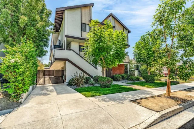 a house view with a garden space