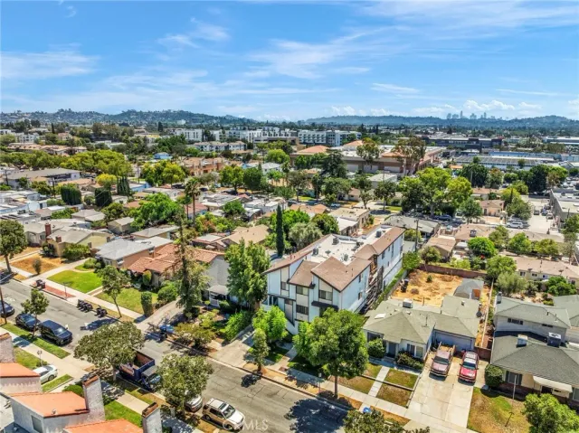 an aerial view of a city with lots of residential buildings