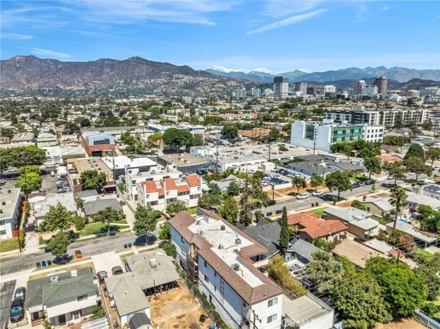 an aerial view of a city with lots of residential buildings