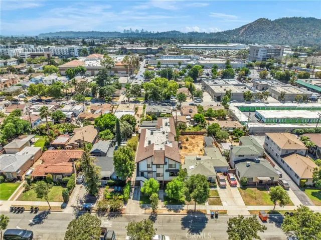 an aerial view of a city with lots of residential buildings
