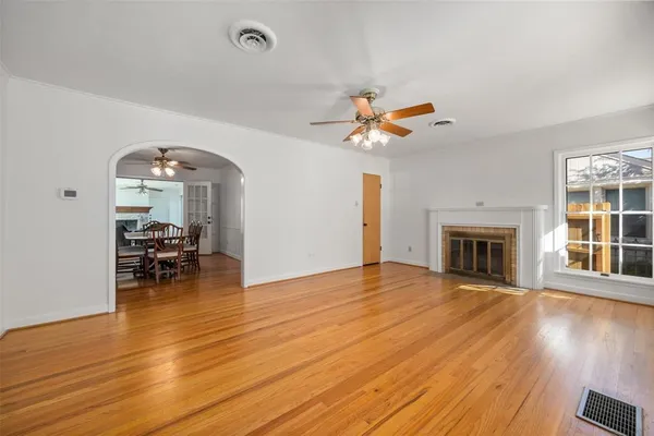 a view of a livingroom with furniture and a fireplace