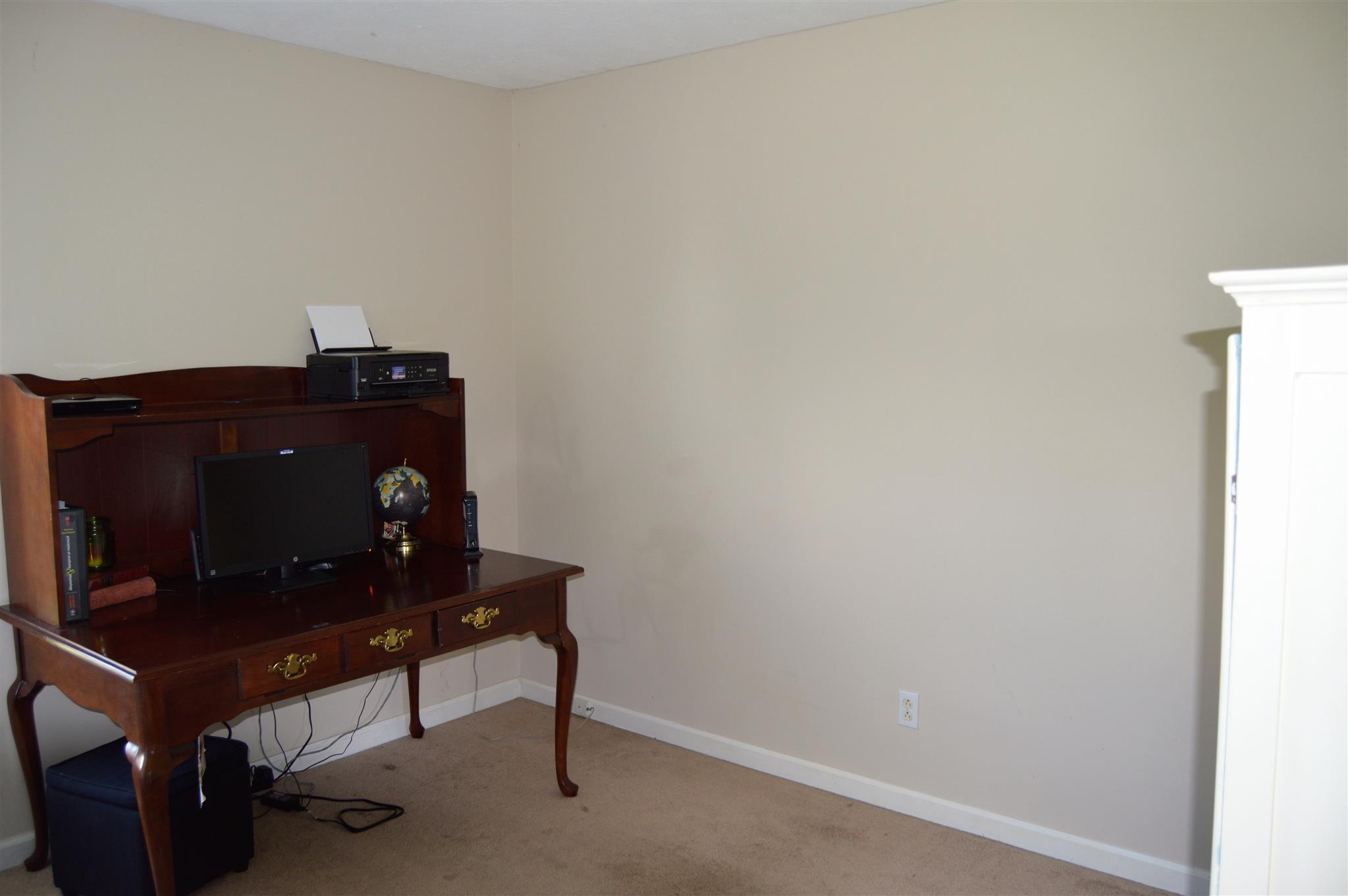 1529 Longview Road Unionville, TN 37180 - Photo 12 of 21 a living room with a piano and wooden floor