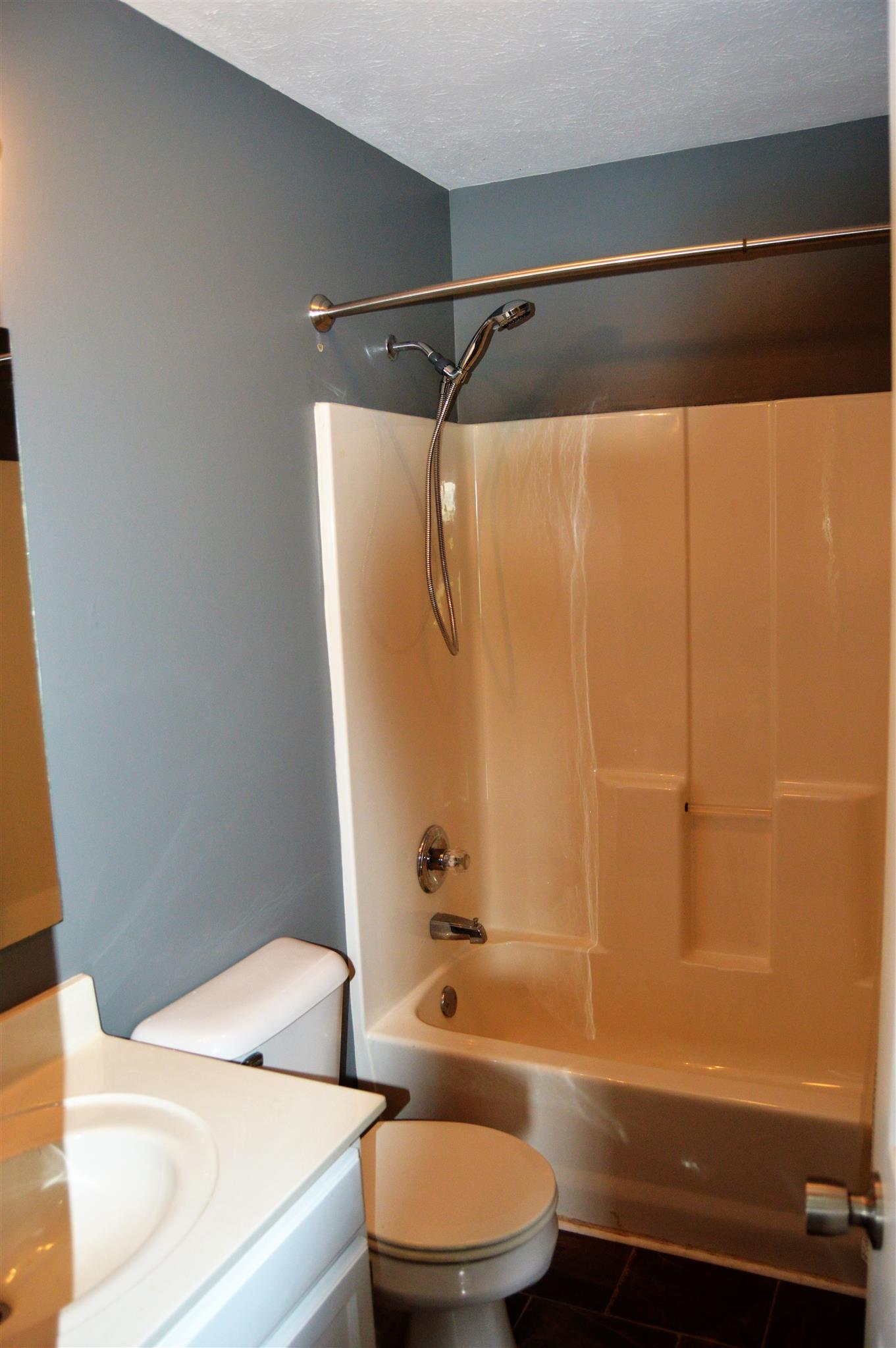 1529 Longview Road Unionville, TN 37180 - Photo 13 of 21 a bathroom with a sink a toilet and shower
