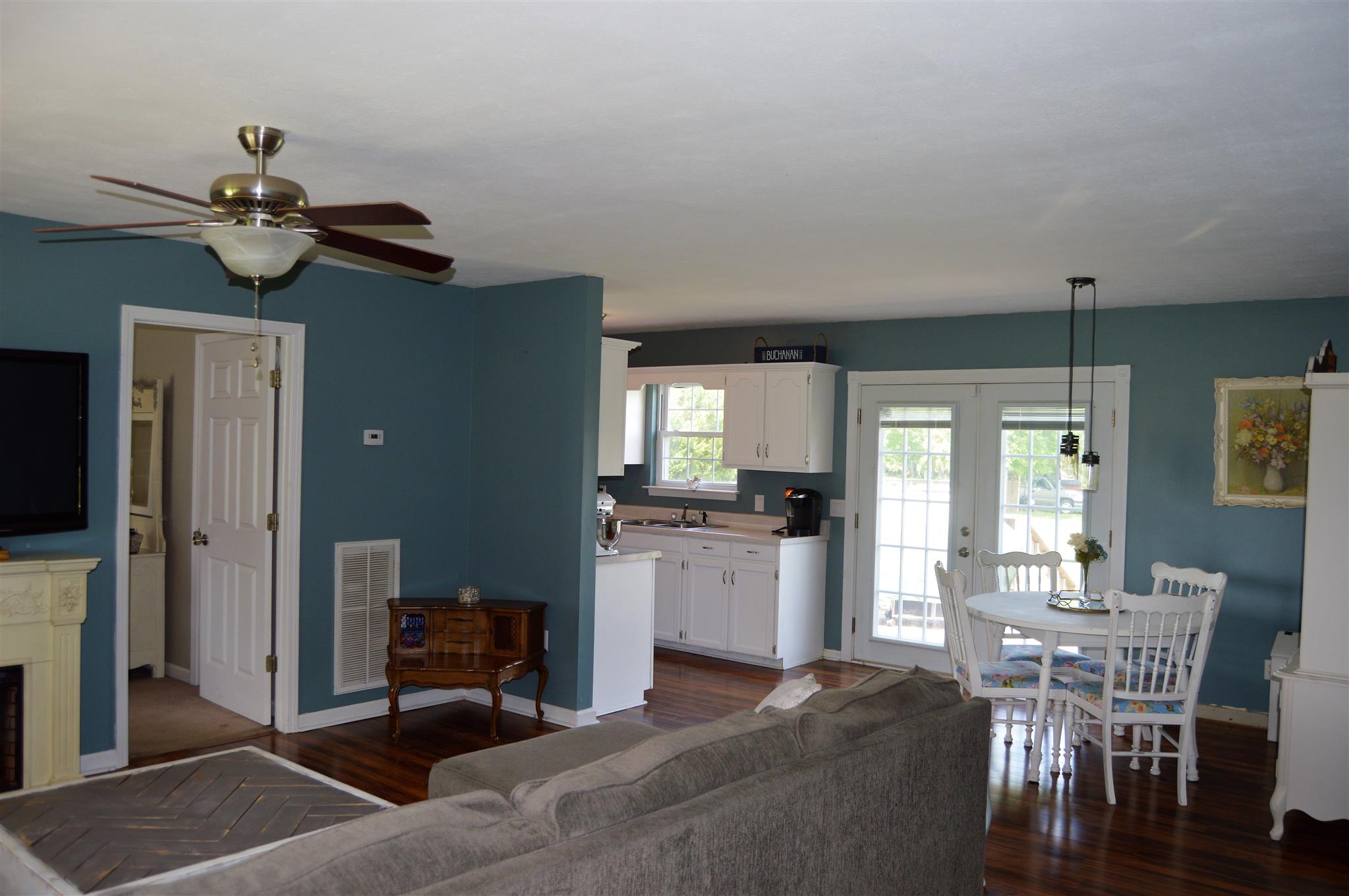 1529 Longview Road Unionville, TN 37180 - Photo 7 of 21 a view of a dining room with furniture and a chandelier
