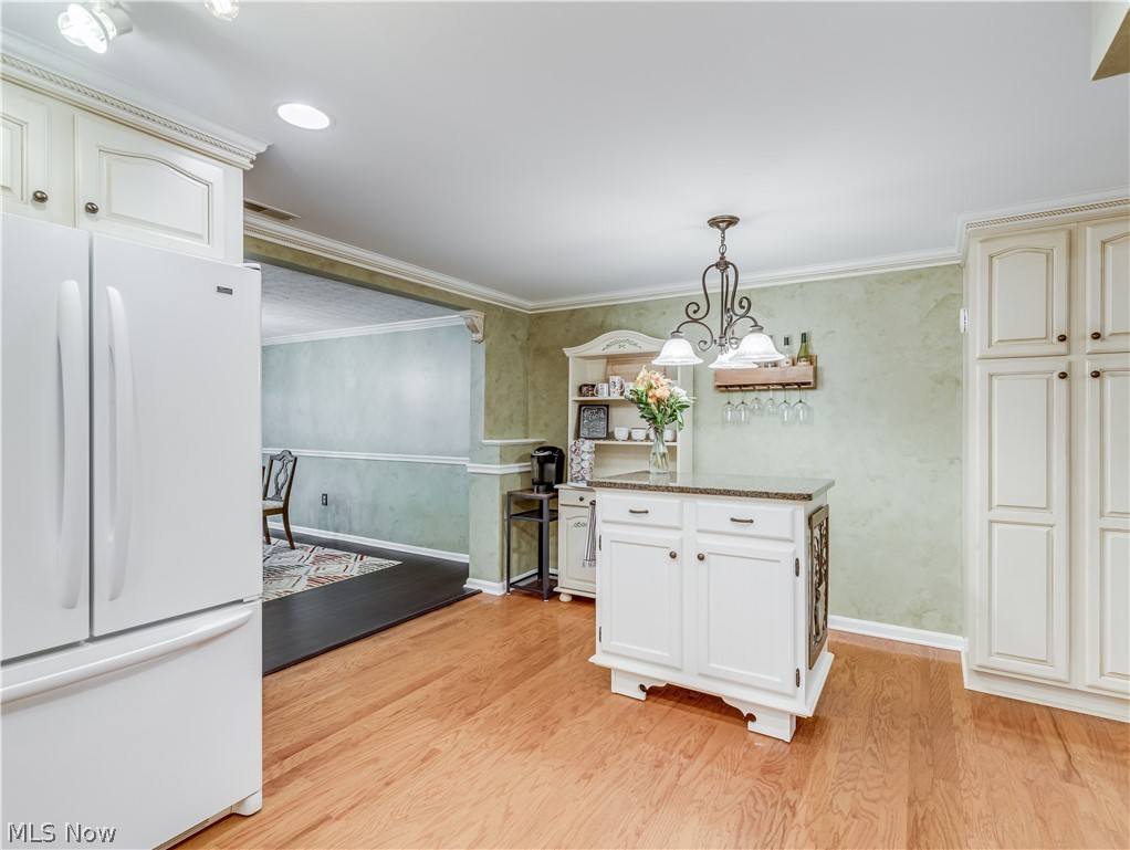 3760 North Santom Road Stow, OH 44224 - Photo 25 of 33 Movable kitchen island with a granite countertop.