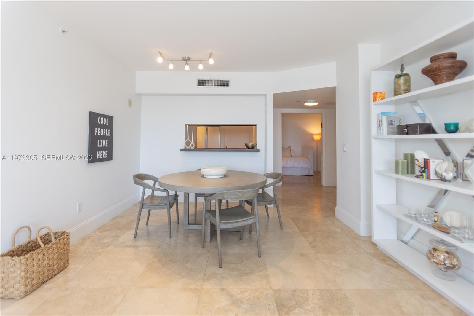 9595 Collins Avenue, Unit N6F Surfside, FL 33154 - Photo 7 of 26 a dining room with furniture and window
