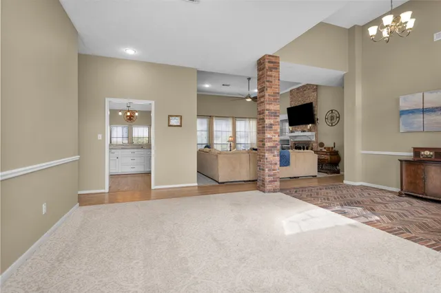 a view of a livingroom with a kitchen