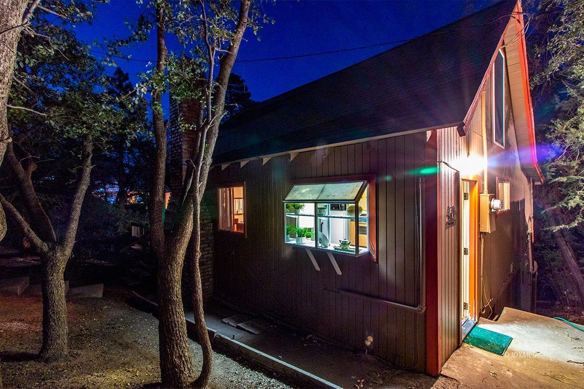 24730 High Grove Road Idyllwild, CA 92549 - Photo 1 of 24 a view of a house with a tree