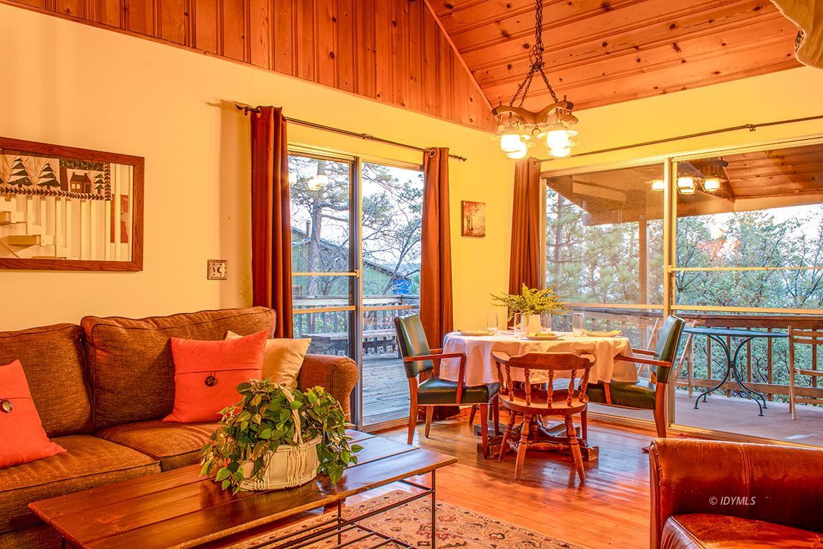 24730 High Grove Road Idyllwild, CA 92549 - Photo 5 of 24 a living room with furniture a large window with outer view