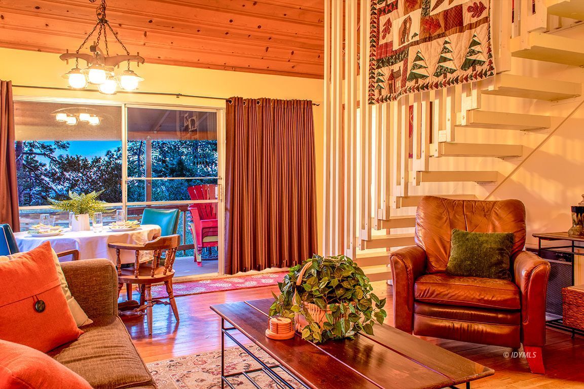24730 High Grove Road Idyllwild, CA 92549 - Photo 7 of 24 a outdoor living space with furniture and a potted plant