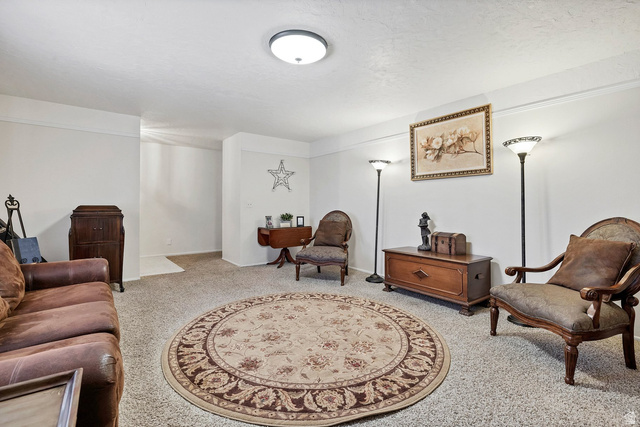 3334 Ute Road St. George, UT 84790 - Photo 3 of 40 Living area featuring light carpet