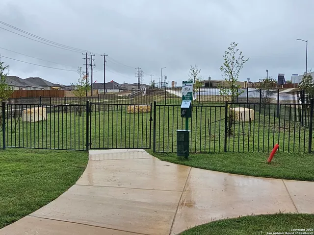 a view of a backyard with a garden