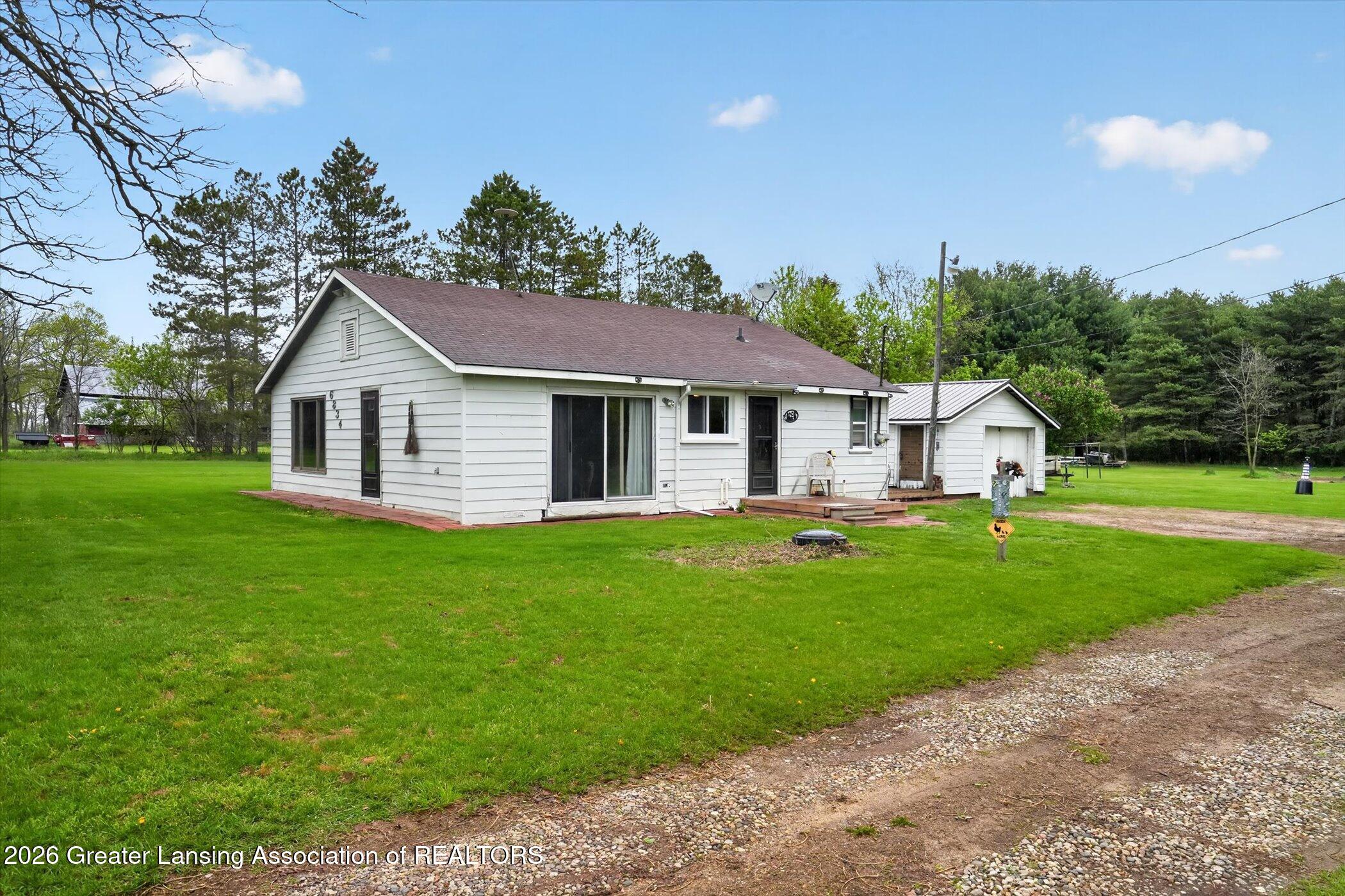 6834 North Wacousta Road Fowler, MI 48835 - Photo 2 of 51 02-6834-N-Wacousta-Rd-WindowStill-Photog
