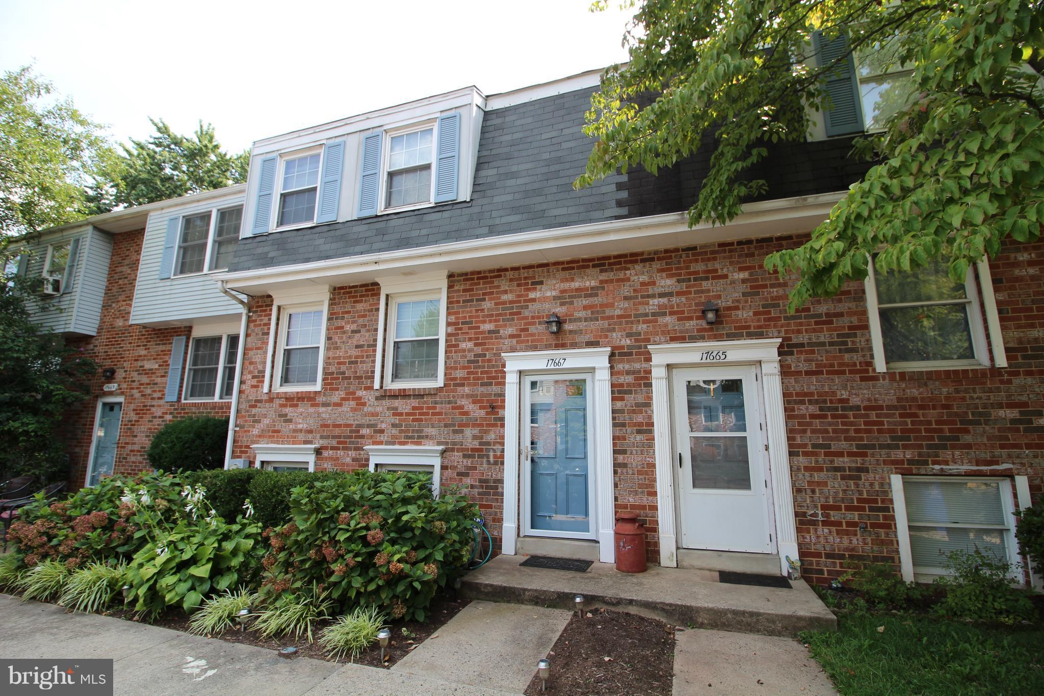 17667 Kohlhoss Road Poolesville, MD 20837 - Photo 1 of 27 a front view of a house with a yard