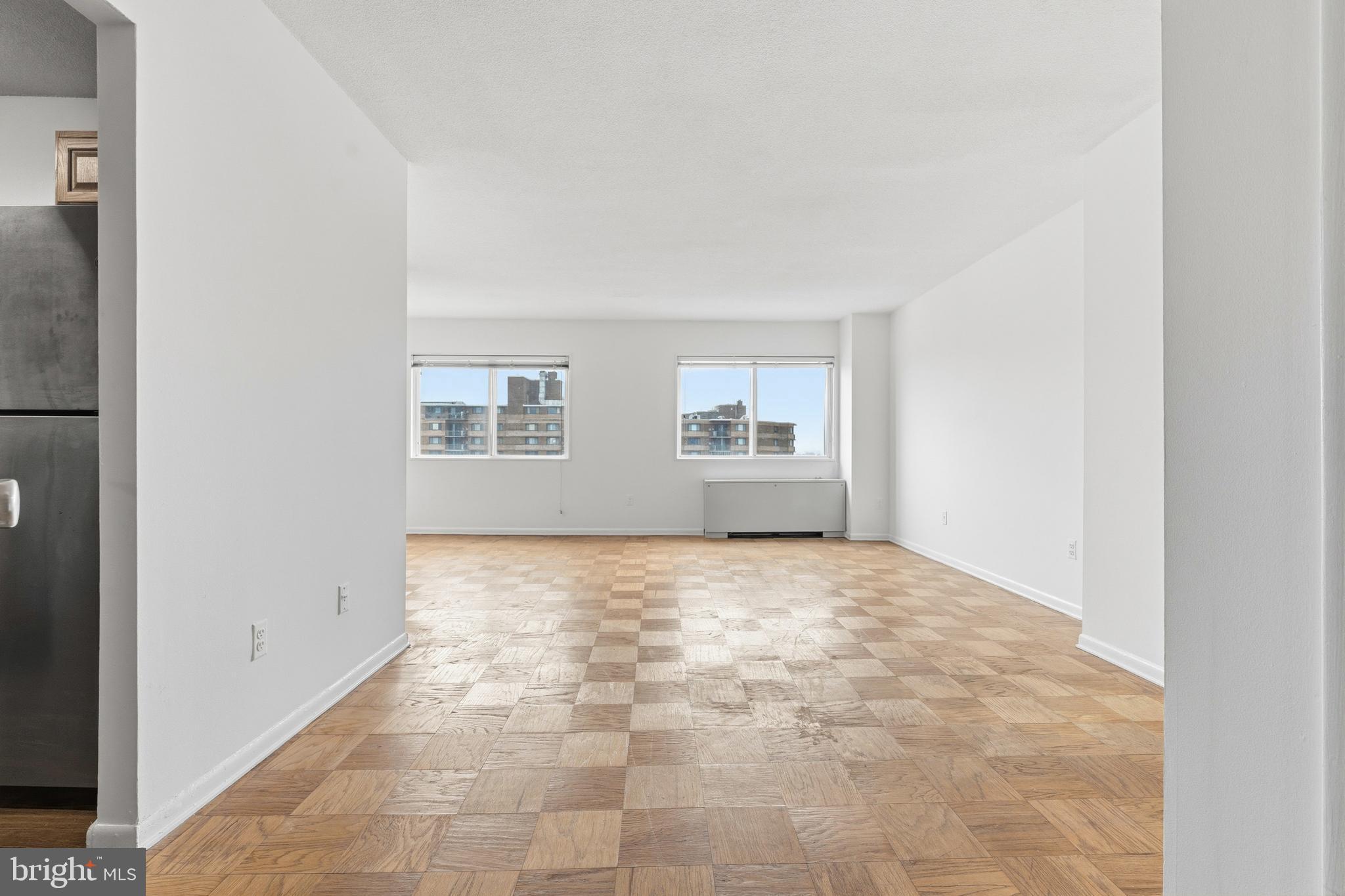 1121 University Boulevard West, Unit 1407B Silver Spring, MD 20902 - Photo 12 of 26 Living Area