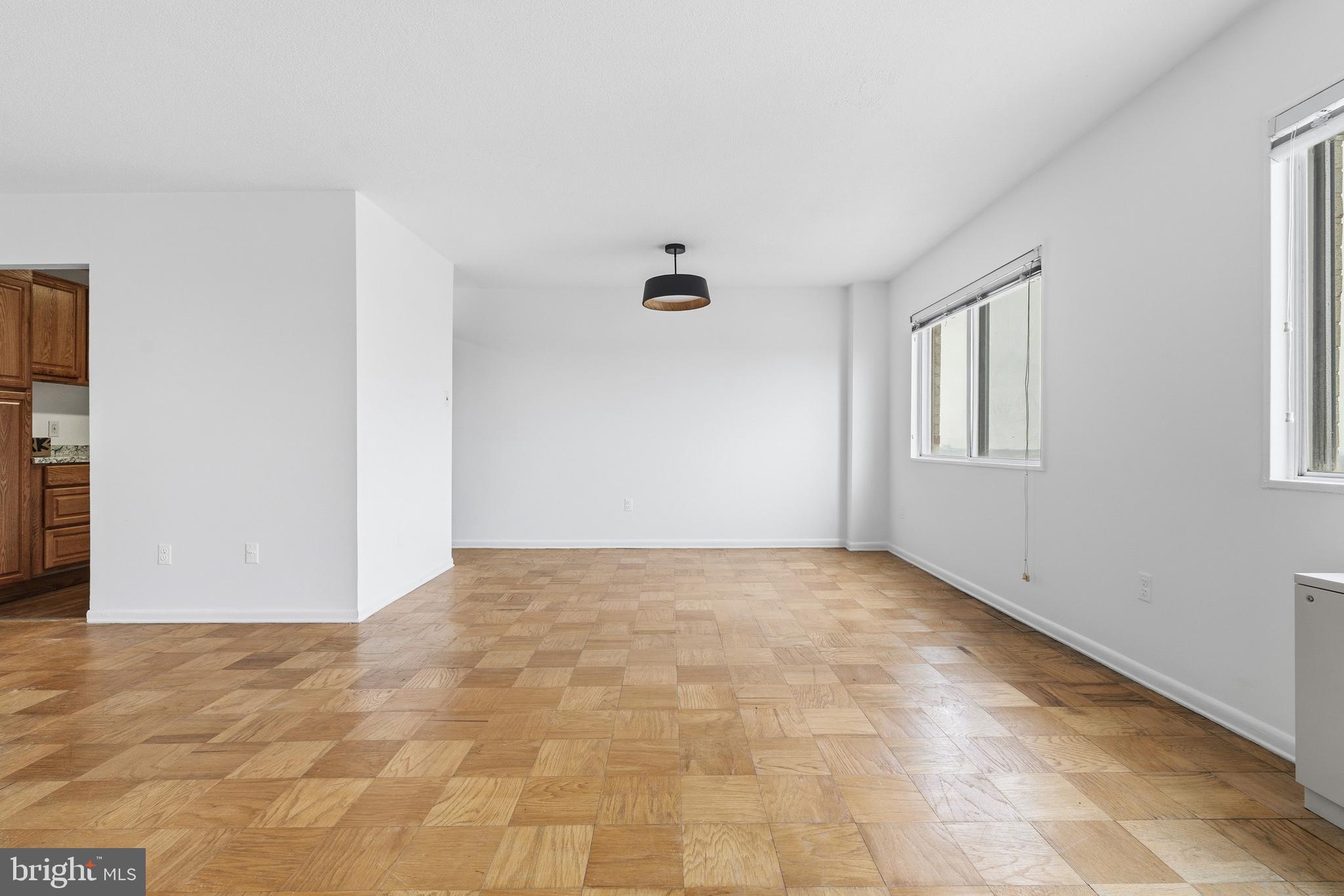 1121 University Boulevard West, Unit 1407B Silver Spring, MD 20902 - Photo 15 of 27 a view of an empty room