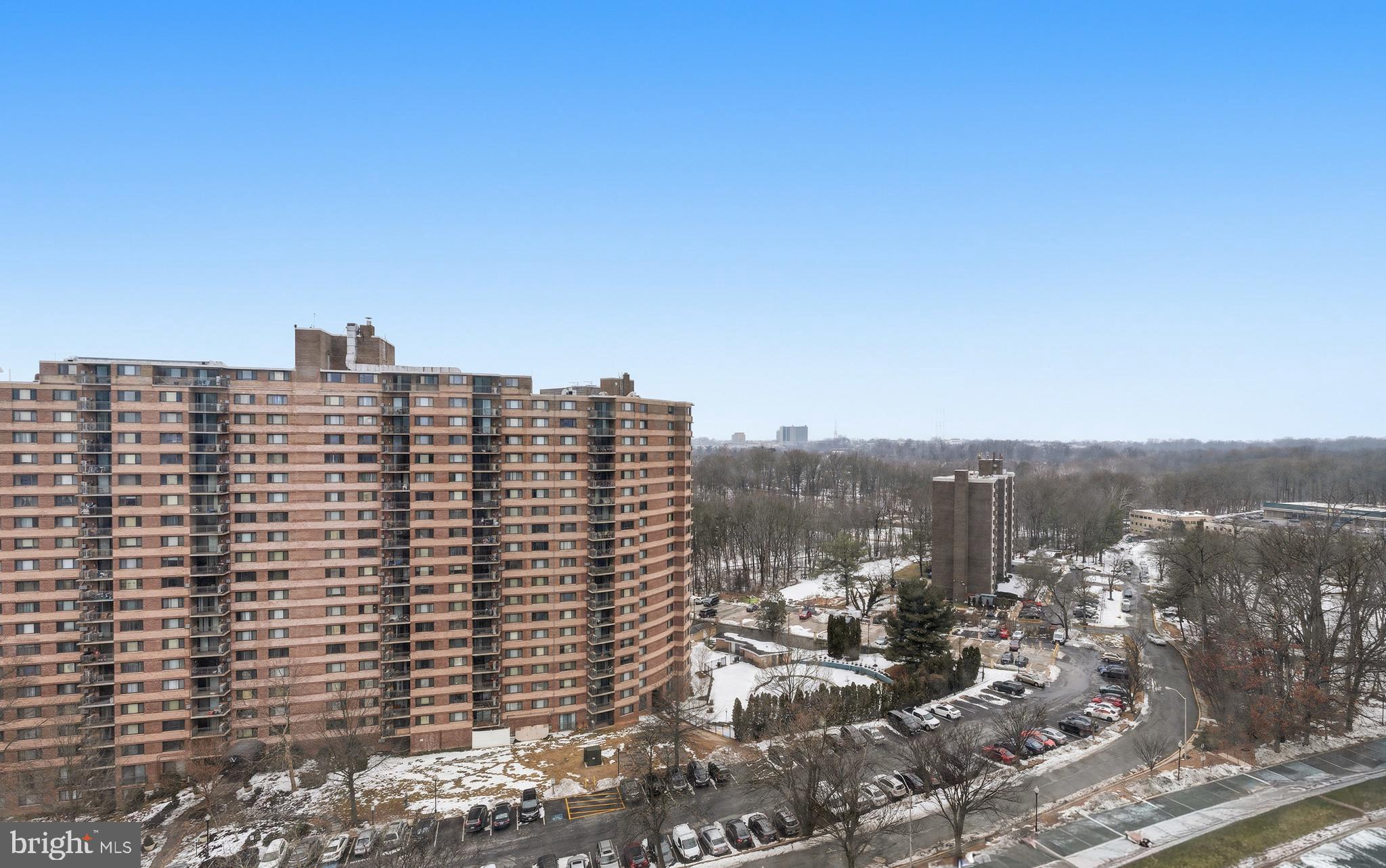 1121 University Boulevard West, Unit 1407B Silver Spring, MD 20902 - Photo 24 of 27 a view of a city with tall buildings