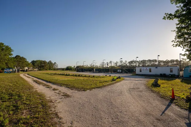 a view of a swimming pool with lounge chair