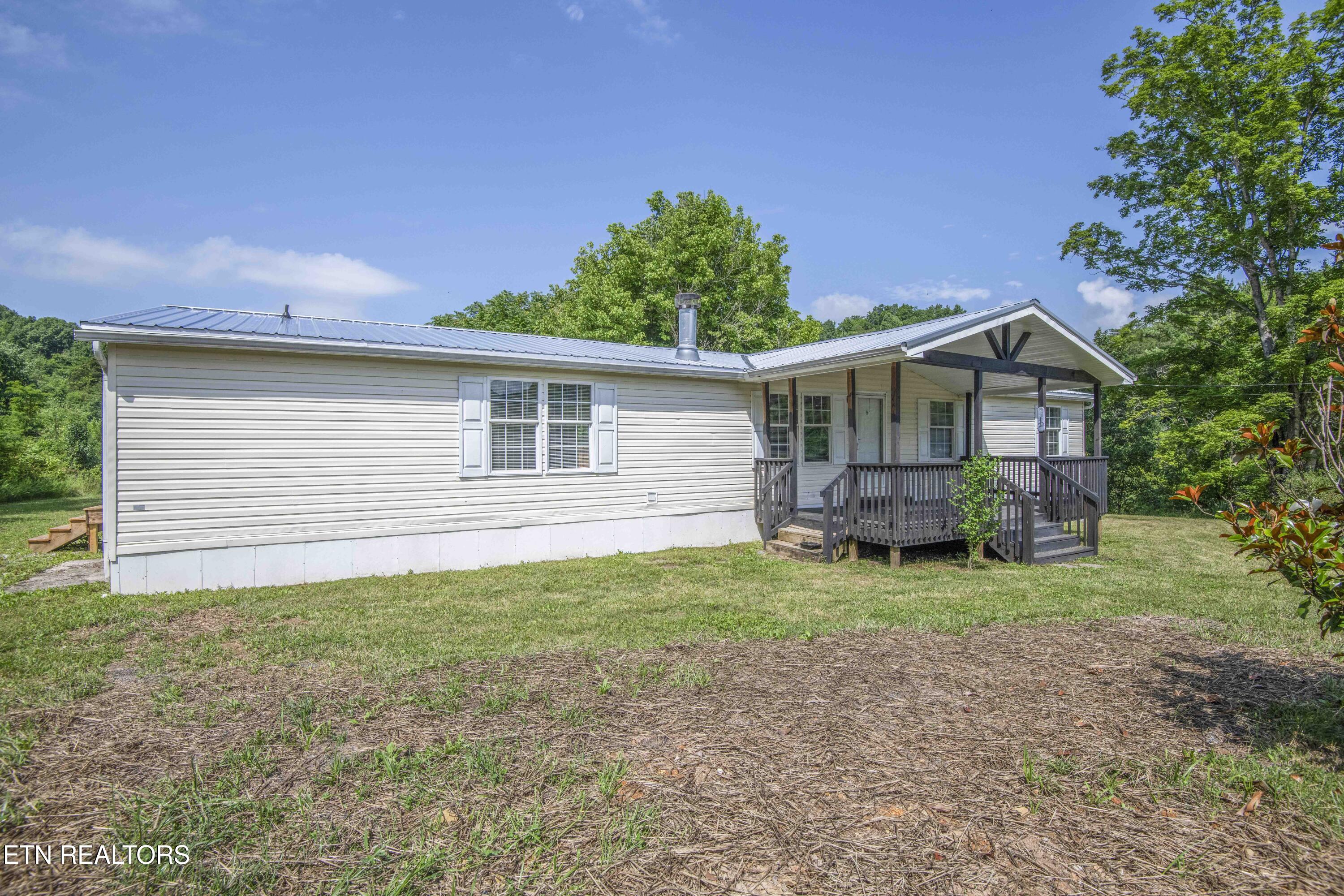 1587 Lower Caney Valley Road Tazewell, TN 37879 - Photo 2 of 42 exterior 1_1