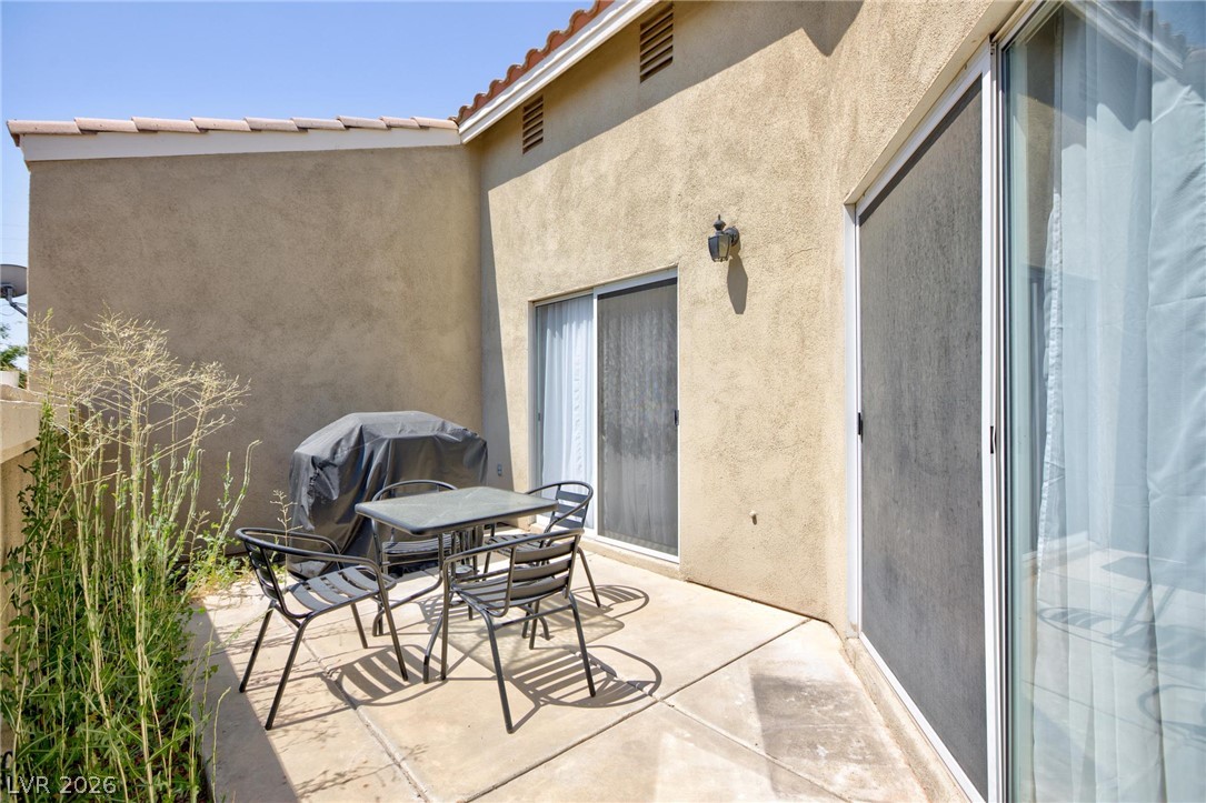 3238 Mystic Ridge Court Las Vegas, NV 89129 - Photo 19 of 31 A private patio space, perfect for al fresco dining and quiet relaxation.