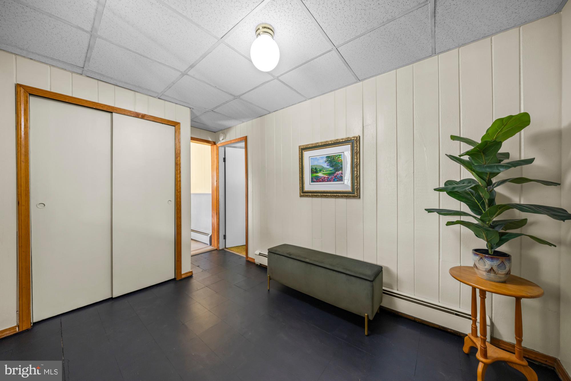 2137 Sicklerville Road Sicklerville, NJ 08081 - Photo 6 of 32 a living room with furniture and a potted plant