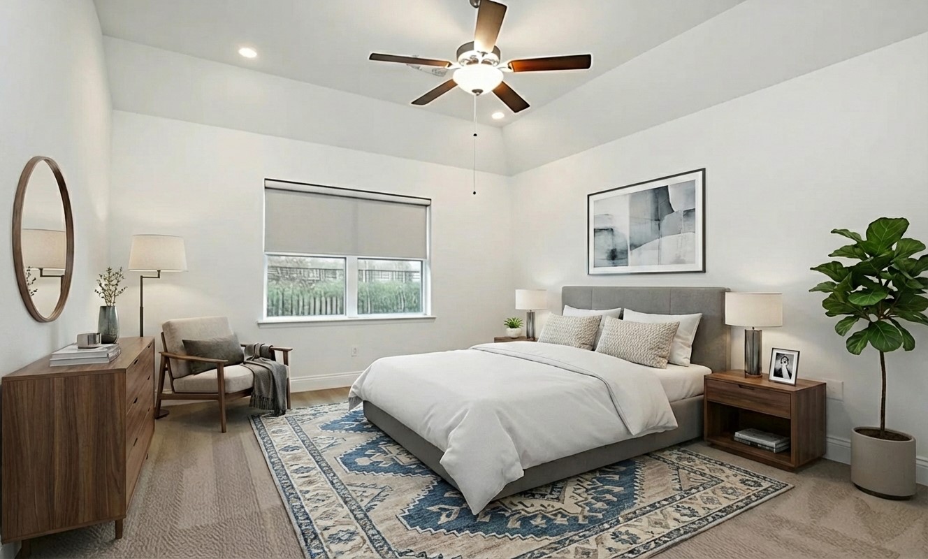 2741 Altissimo Court Spring, TX 77386 - Photo 12 of 30 The primary bedroom featuring high vaulted ceilings and a modern ceiling fan! This room is anchored by a large window that provides abundant natural light. *photo is virtually staged*