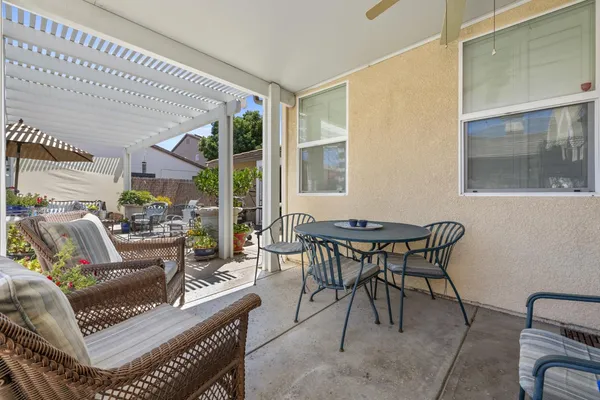 a view of a livingroom with furniture and a table