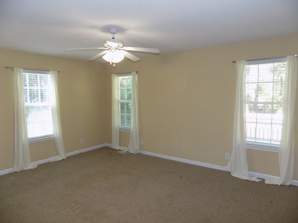 166 Patton Road Gray, GA 31032 - Photo 15 of 22 a view of an empty room with a window