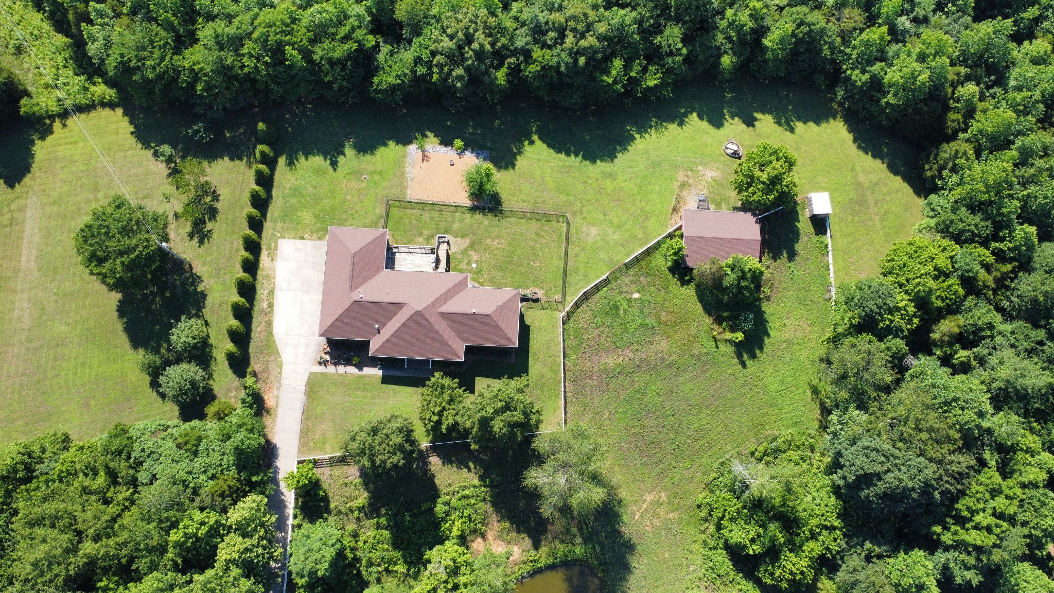 2251 Davidson Graveyard Road Clarksville, TN 37043 - Photo 76 of 78 an aerial view of lake residential house with outdoor space and trees around