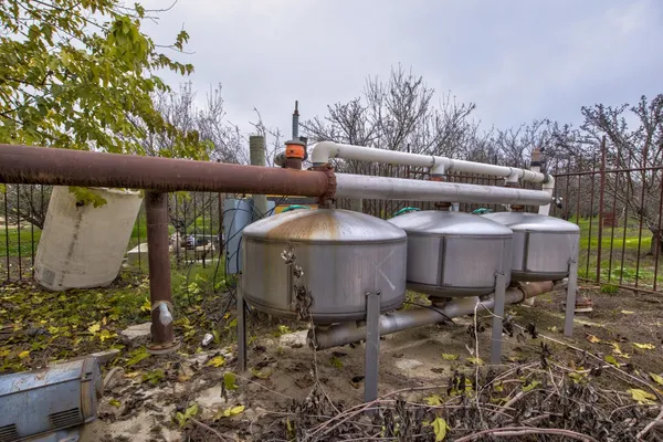 a view of a chairs and table in the patio