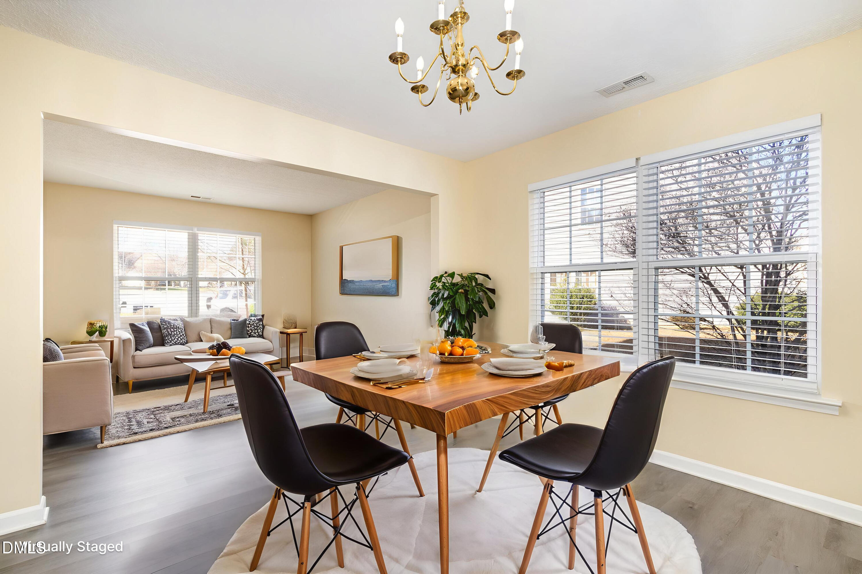 4809 Kaycee Court Raleigh, NC 27616 - Photo 15 of 41 a view of a dining room with furniture window and outside view