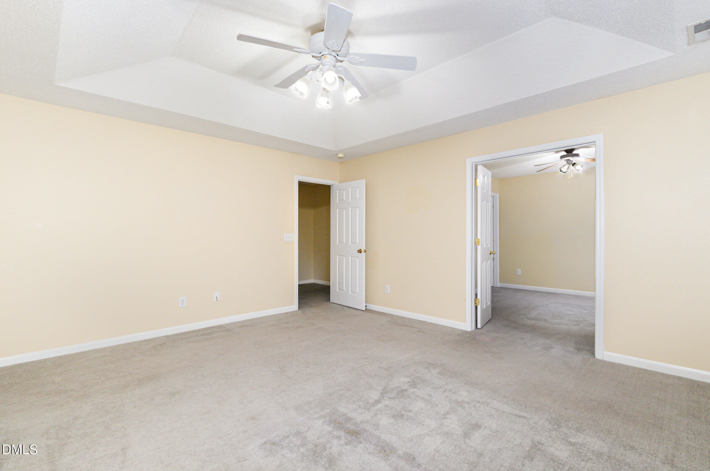 4809 Kaycee Court Raleigh, NC 27616 - Photo 27 of 41 an empty room with a ceiling fan and a window