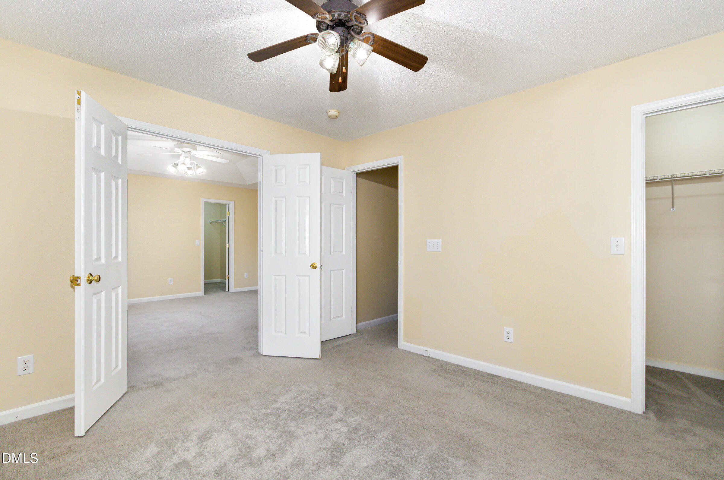 4809 Kaycee Court Raleigh, NC 27616 - Photo 33 of 41 a view of an empty room and chandelier fan