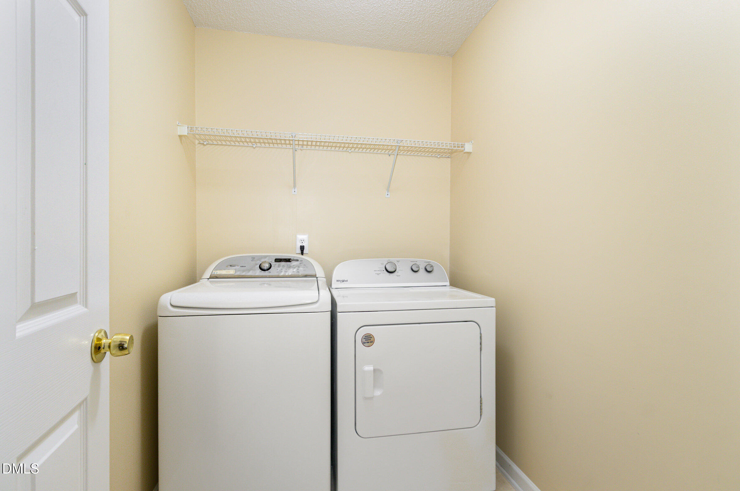 4809 Kaycee Court Raleigh, NC 27616 - Photo 36 of 41 a utility room with dryer and washer