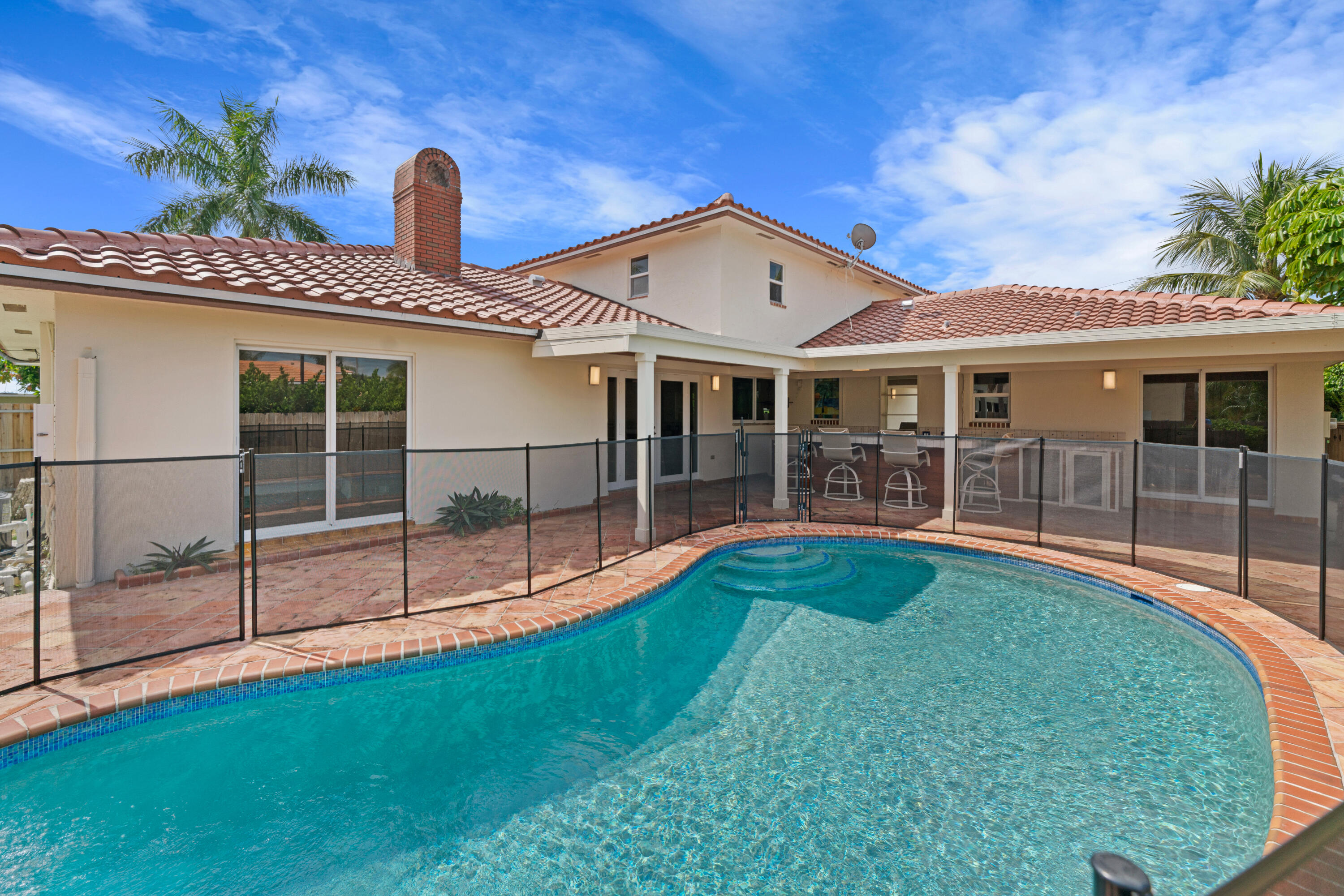 18 Duke Drive Lake Worth, FL 33460 - Photo 1 of 29 a view of a house with backyard and porch