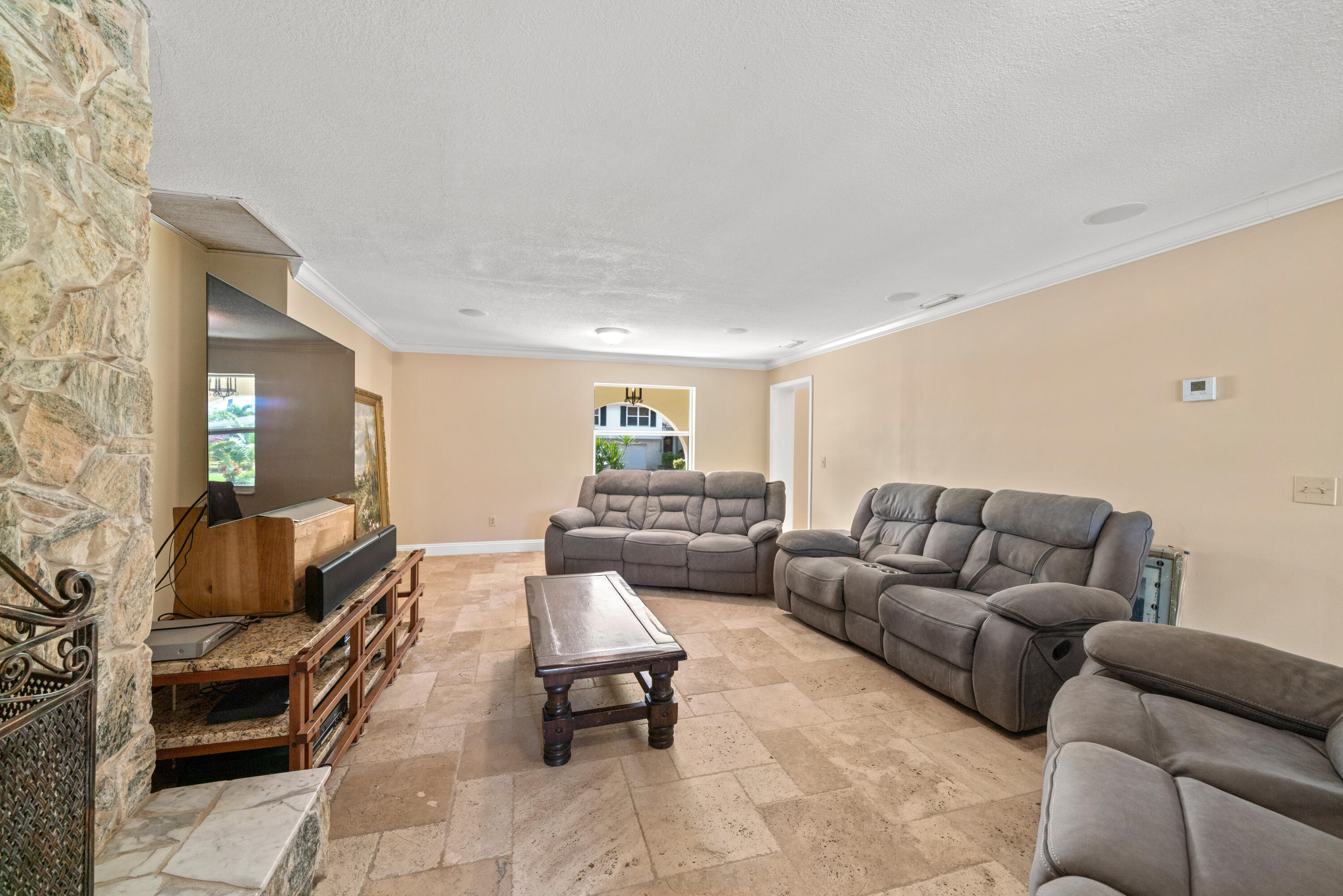 18 Duke Drive Lake Worth, FL 33460 - Photo 13 of 29 a living room with furniture and a couch
