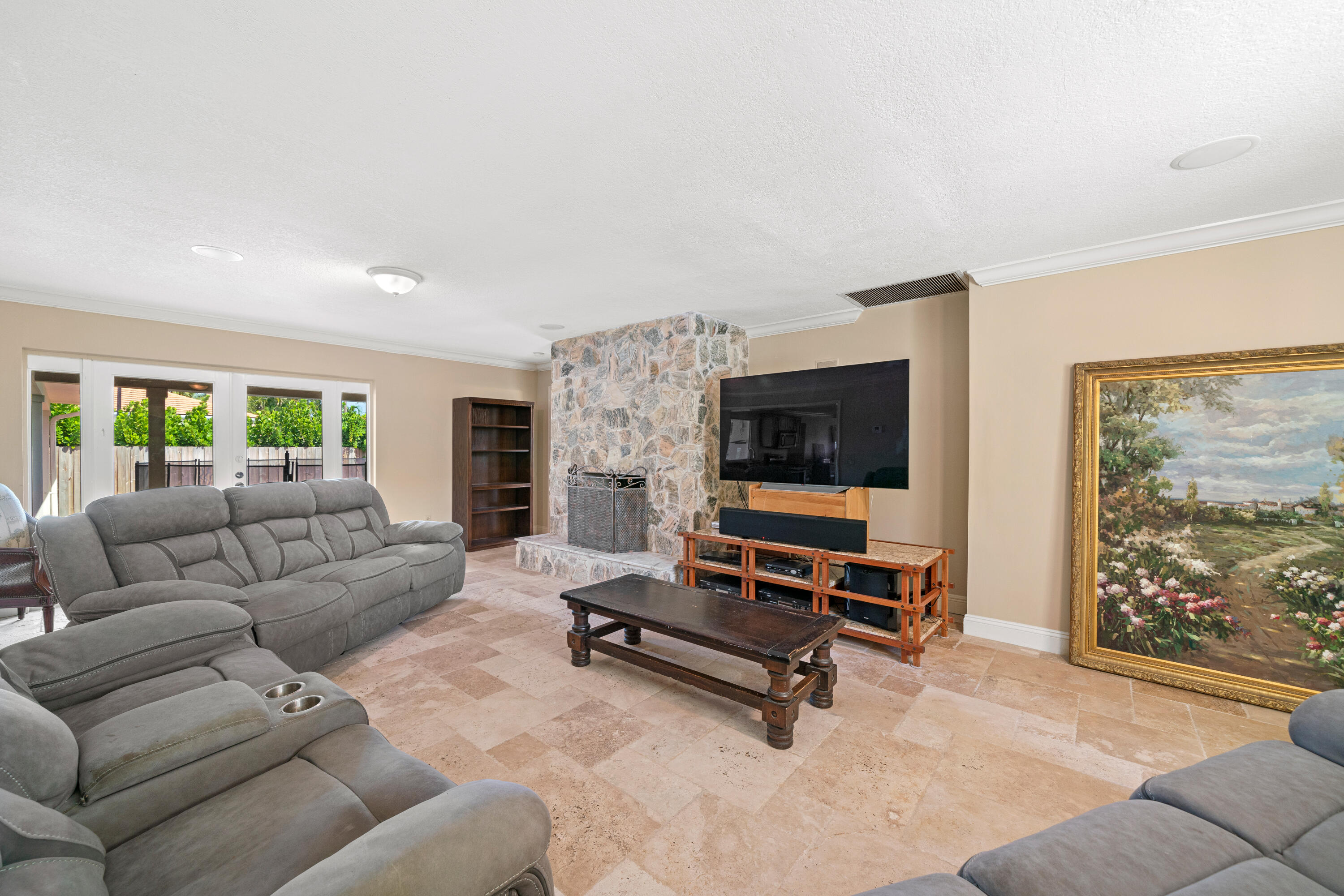 18 Duke Drive Lake Worth, FL 33460 - Photo 14 of 29 a living room with furniture and a flat screen tv