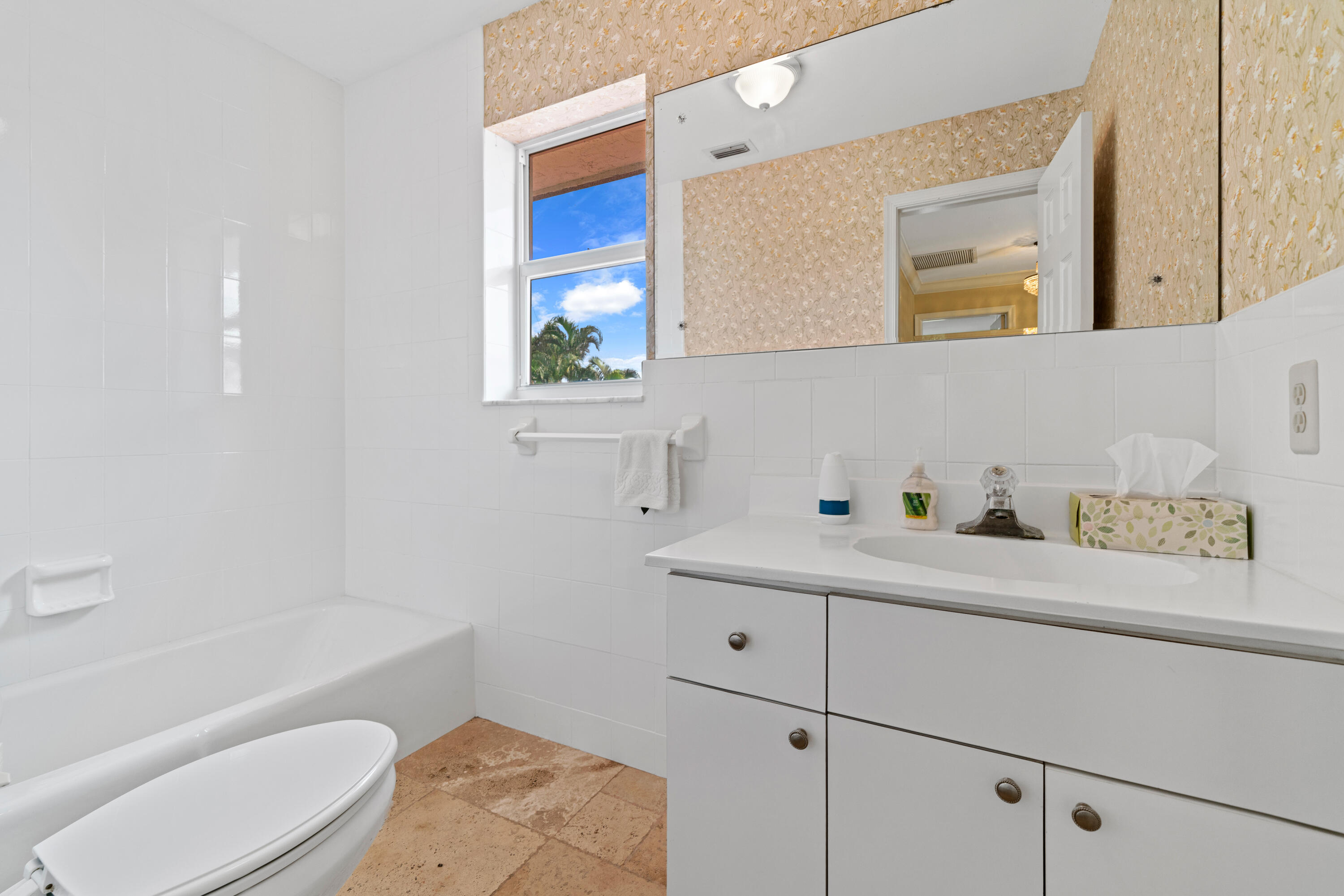 18 Duke Drive Lake Worth, FL 33460 - Photo 25 of 29 a bathroom with a sink a toilet and bathtub