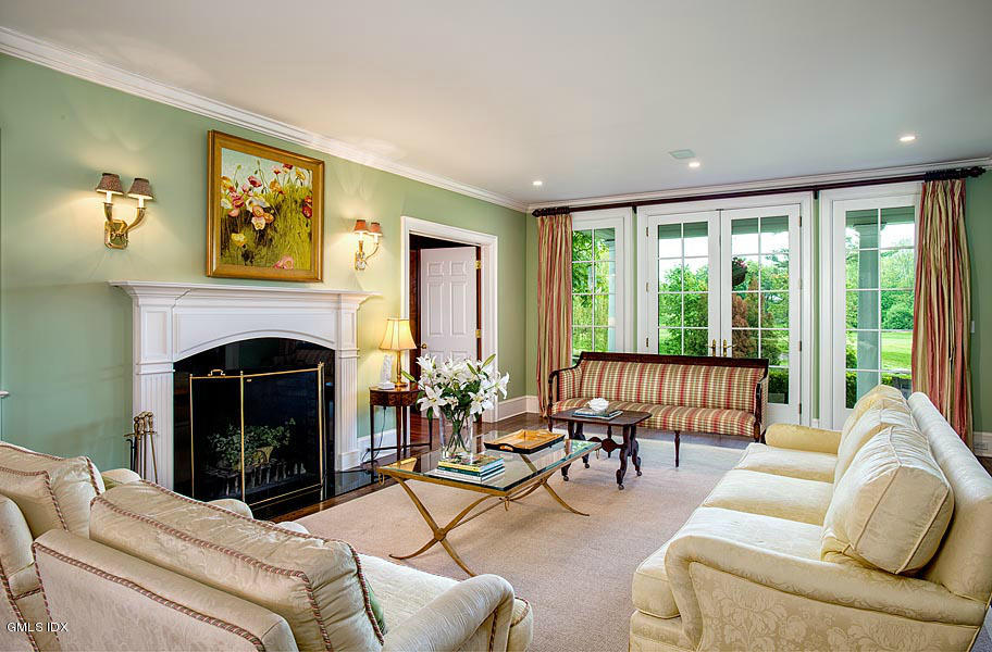 14 Golf Club Road Greenwich, CT 06830 - Photo 6 of 20 a living room with furniture and a fireplace