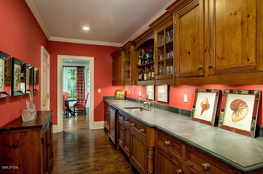 14 Golf Club Road Greenwich, CT 06830 - Photo 8 of 20 a kitchen with stainless steel appliances granite countertop a stove a sink and dishwasher a oven with wooden cabinets