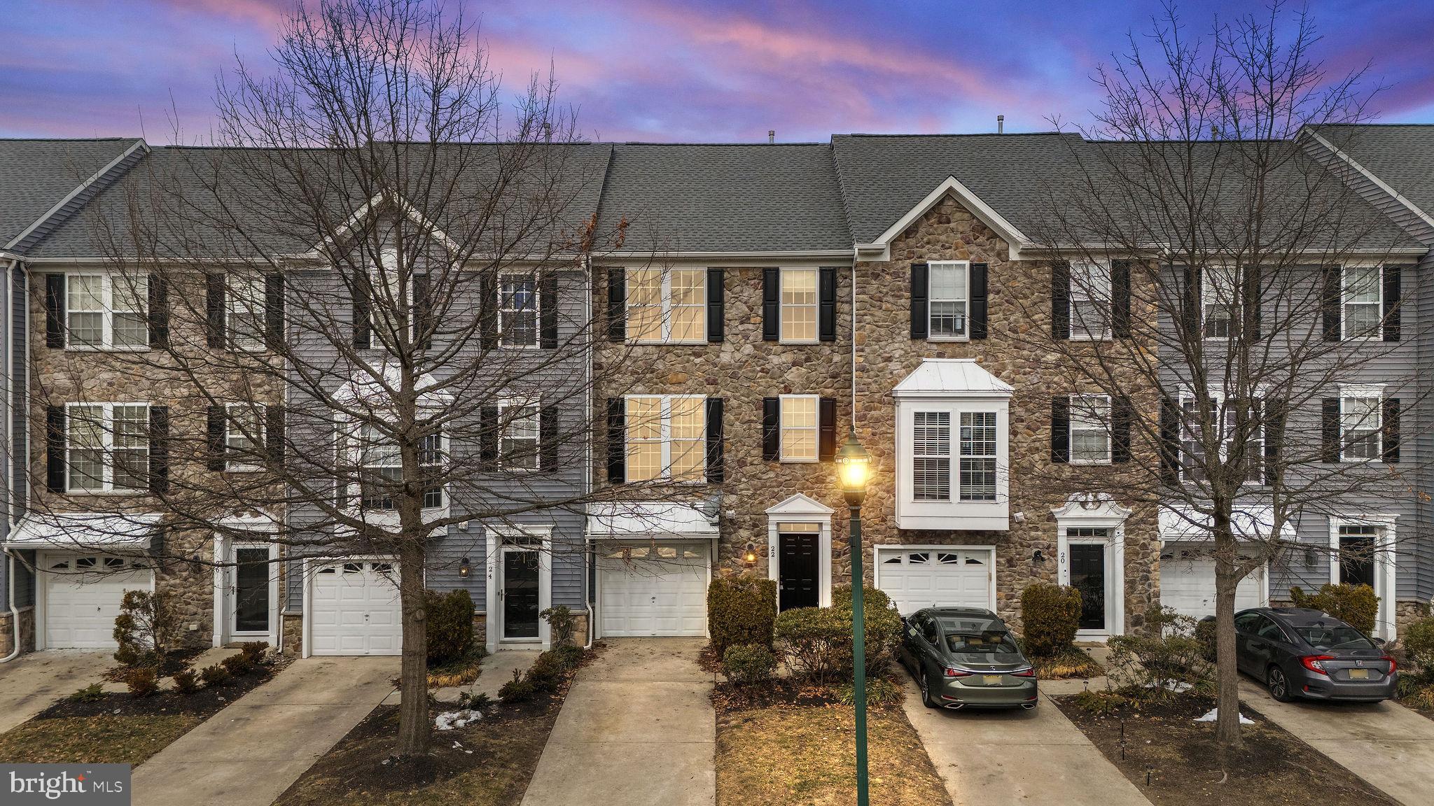 22 River Lane Delanco, NJ 08075 - Photo 1 of 43 a front view of a houses with yard