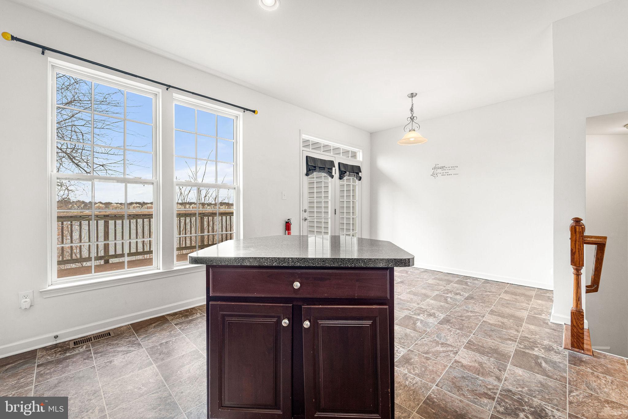 22 River Lane Delanco, NJ 08075 - Photo 13 of 43 a view of a kitchen with a sink and a window