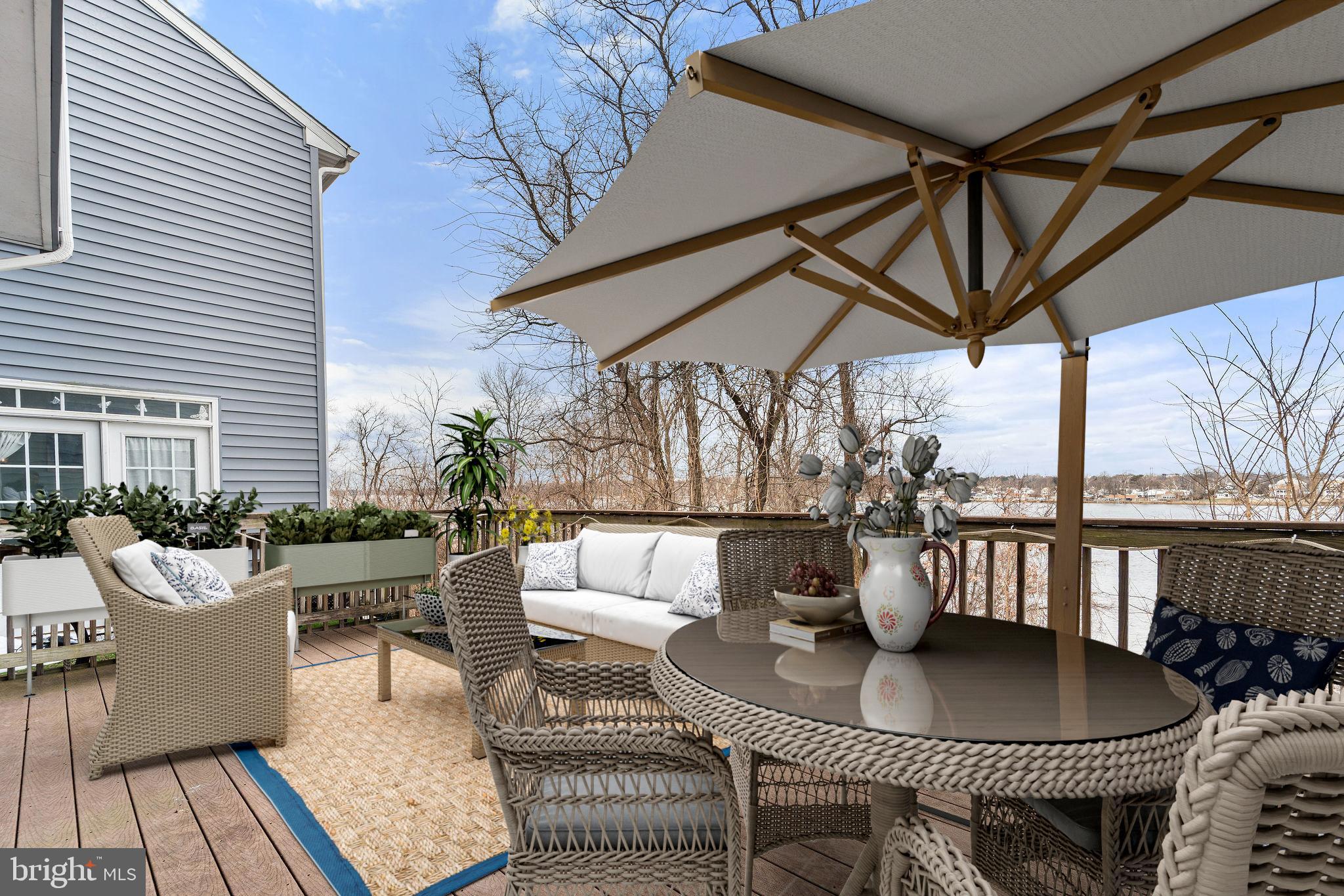 22 River Lane Delanco, NJ 08075 - Photo 18 of 43 a balcony with furniture and a rug