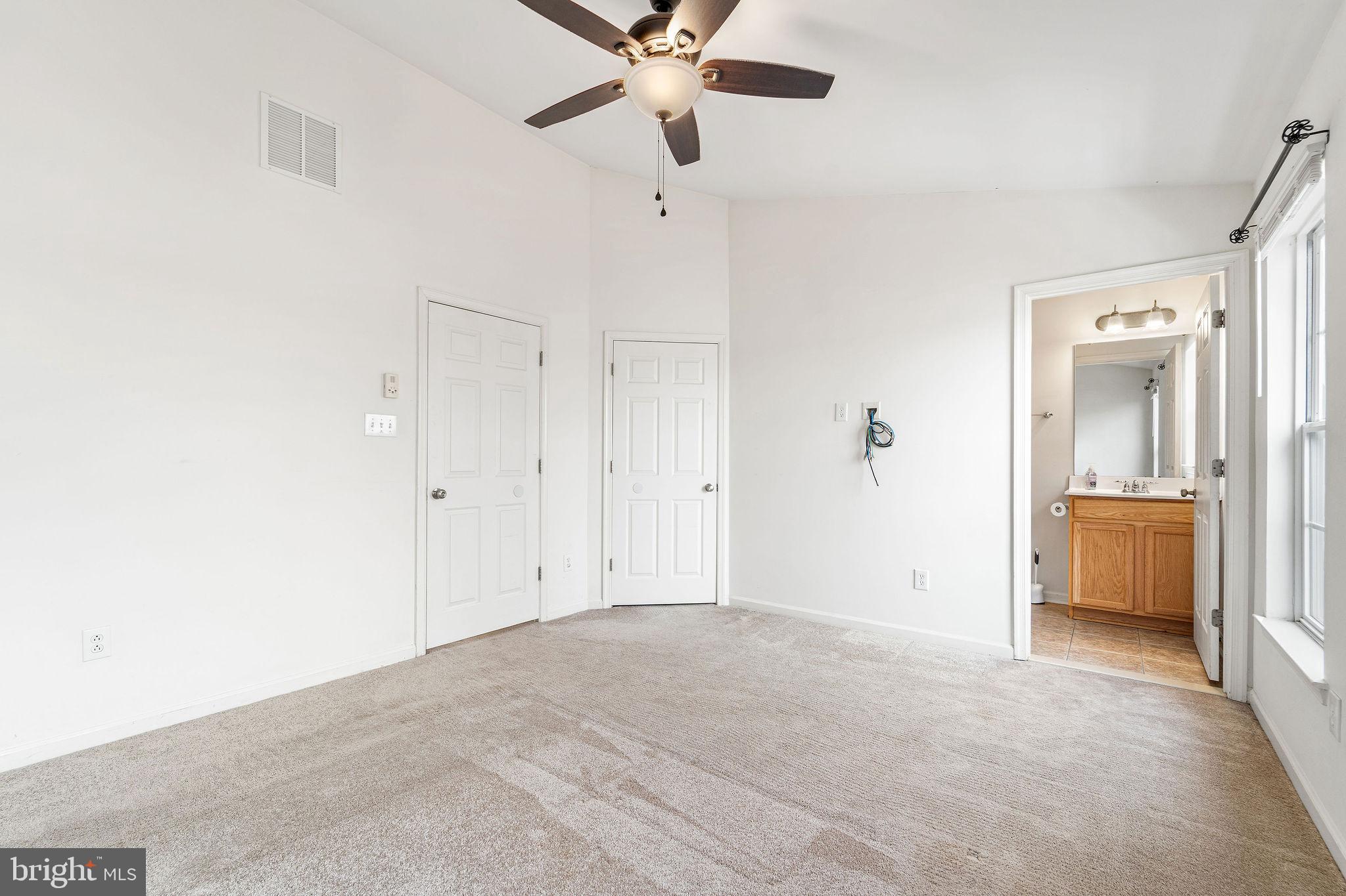 22 River Lane Delanco, NJ 08075 - Photo 27 of 43 a view of a livingroom with a ceiling fan and window