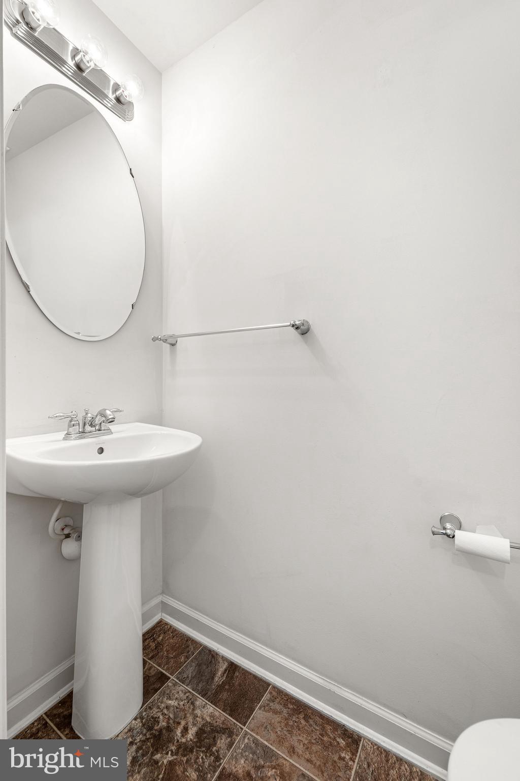 22 River Lane Delanco, NJ 08075 - Photo 33 of 43 a bathroom with a sink a toilet and mirror