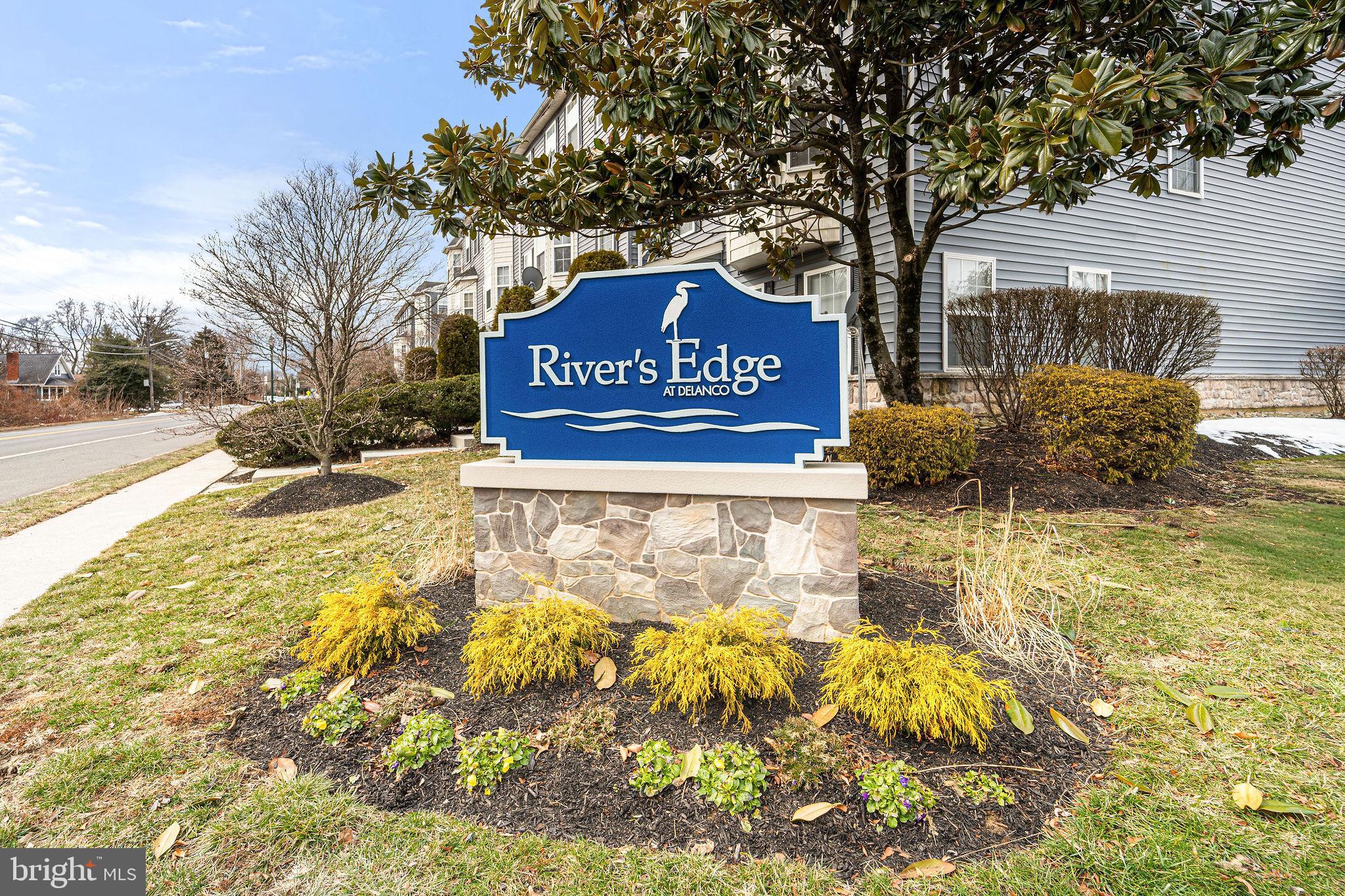 22 River Lane Delanco, NJ 08075 - Photo 39 of 43 a sign board with yard