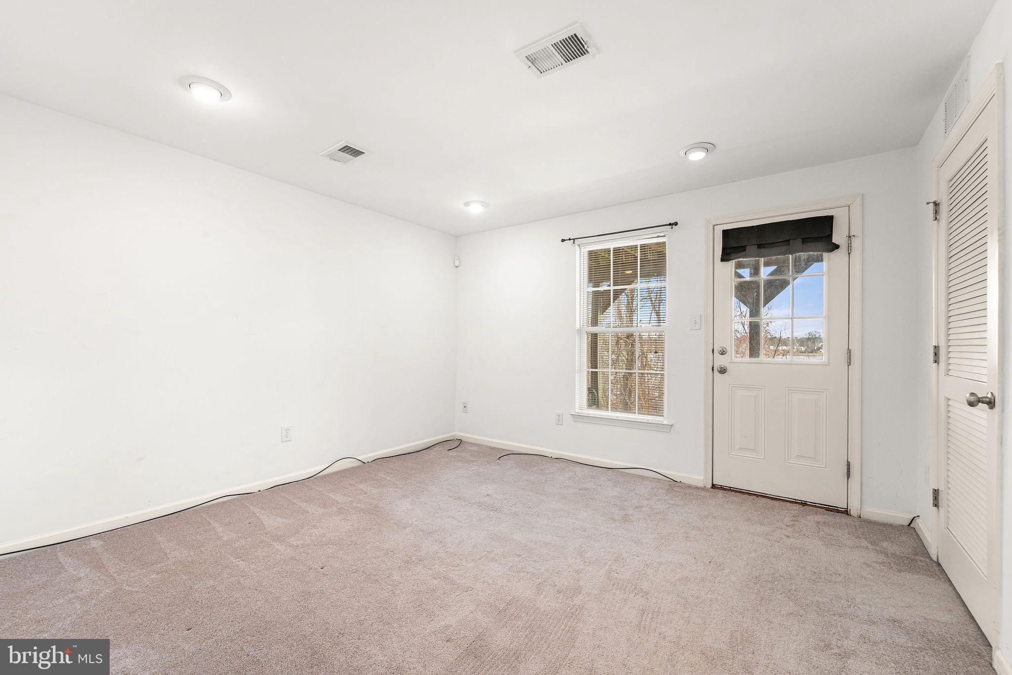 22 River Lane Delanco, NJ 08075 - Photo 8 of 43 an empty room with windows