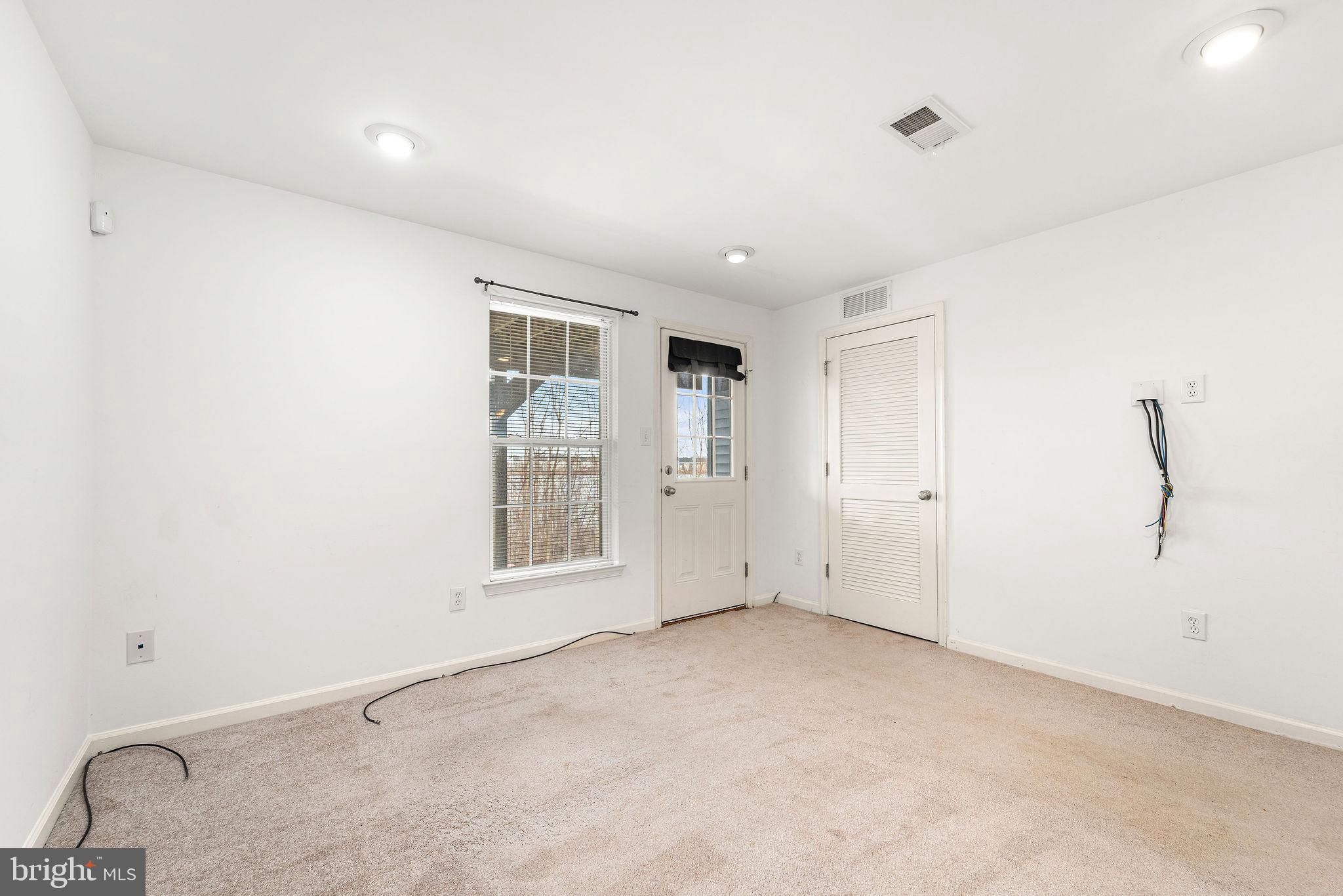 22 River Lane Delanco, NJ 08075 - Photo 9 of 43 an empty room with windows