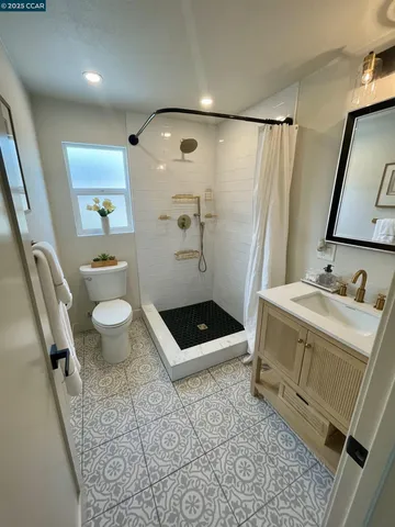 a view of backyard with barbeque grill and outdoor seating